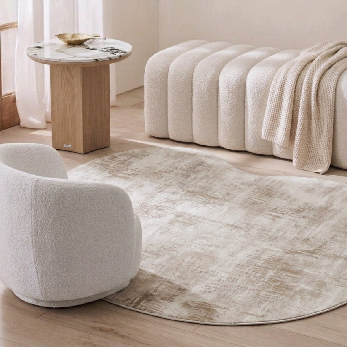 Lifestyle room scene featuring neutral furniture and a rug in a modern living room corner