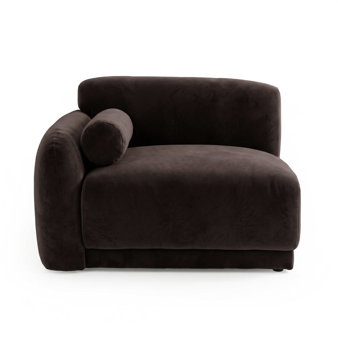 Plush dark brown armchair with velvet upholstery on white background