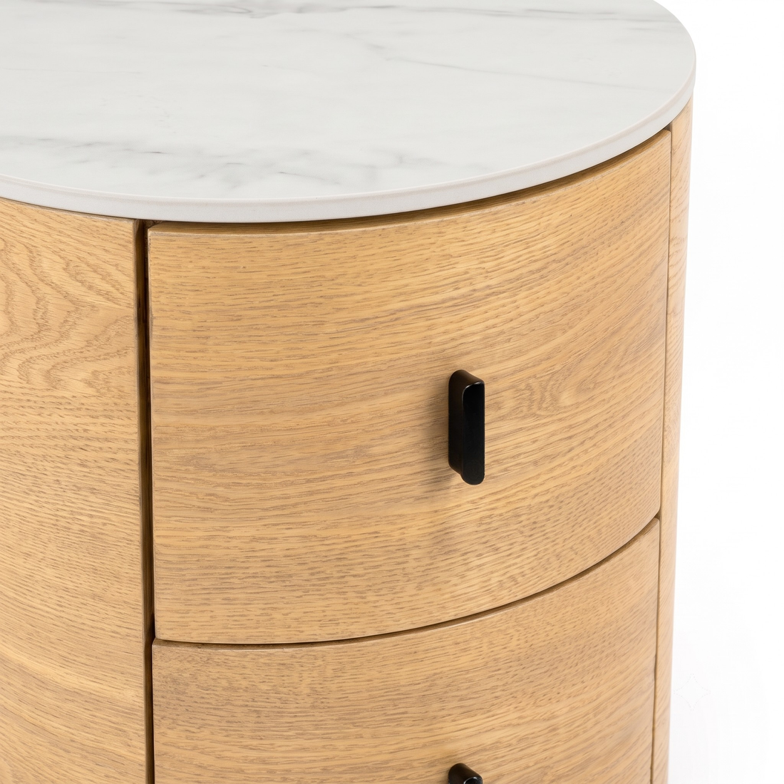 Partial view of a round wooden side table with marble-look top on white background