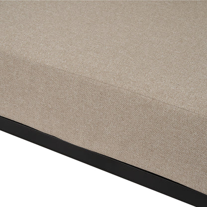 Close-up of beige upholstered cushion on white background.