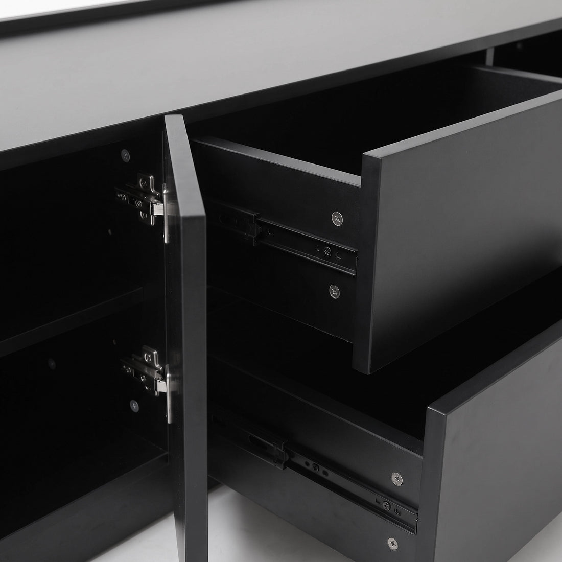 Close-up of black cabinet drawers and hardware