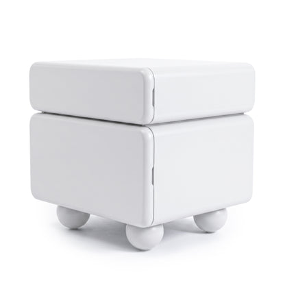 Modern white cubic side table with rounded corners and spherical feet on white background