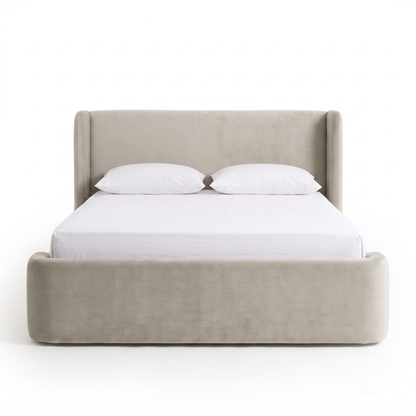 Full view of an upholstered bed on a white background