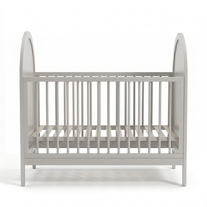 Full view of grey baby crib on white background