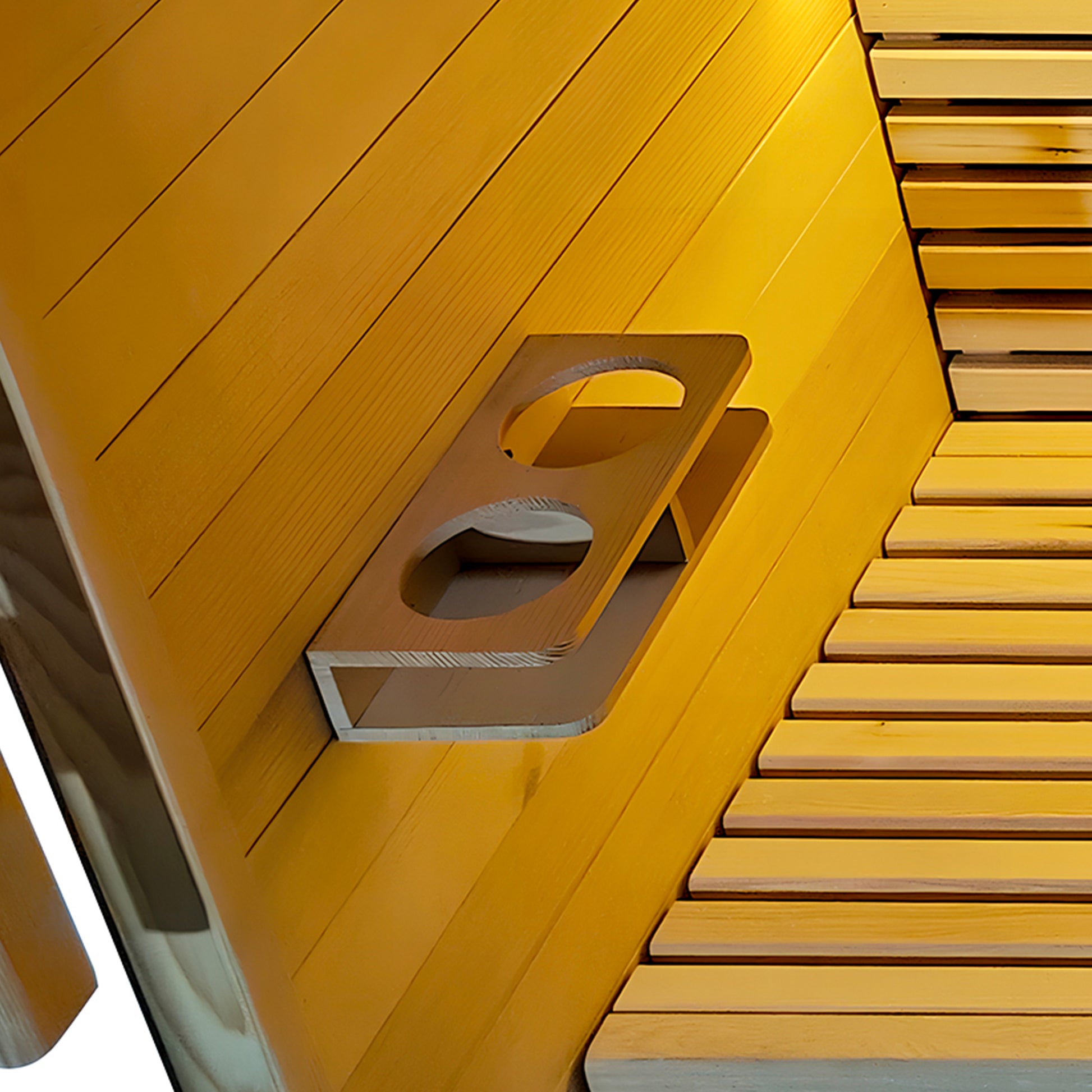 Close view of a wooden bench and wall-mounted cup holder