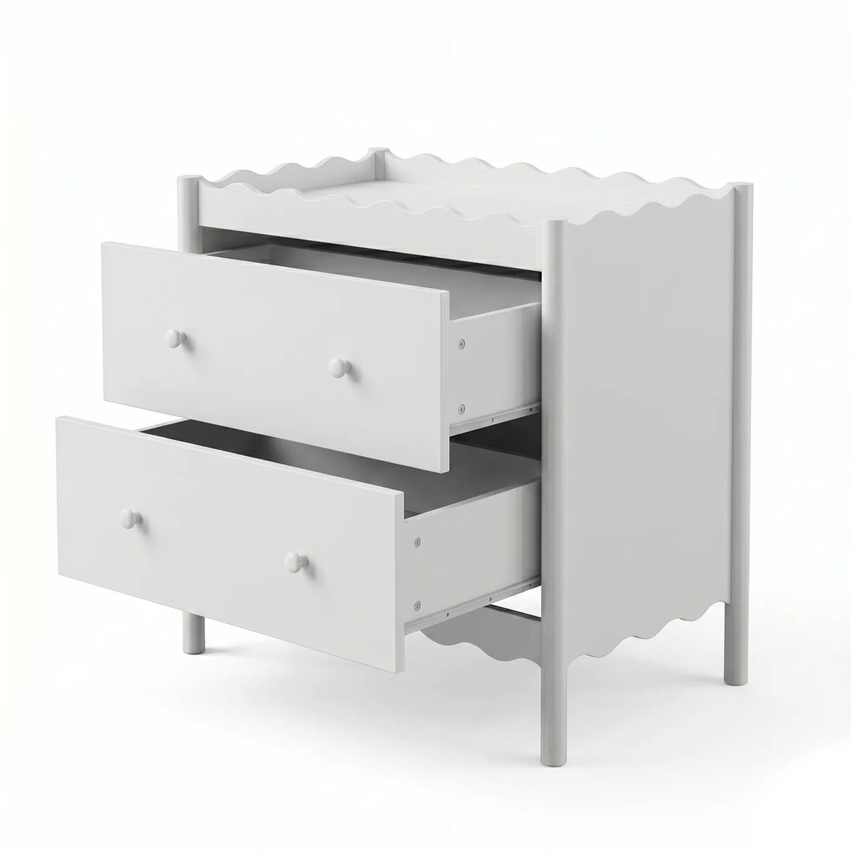 A white two-drawer baby change table featuring a decorative scalloped edge on the top surface and the base, complemented by simple round knobs.